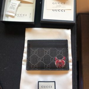 Gucci GG Supreme card case with wolf head